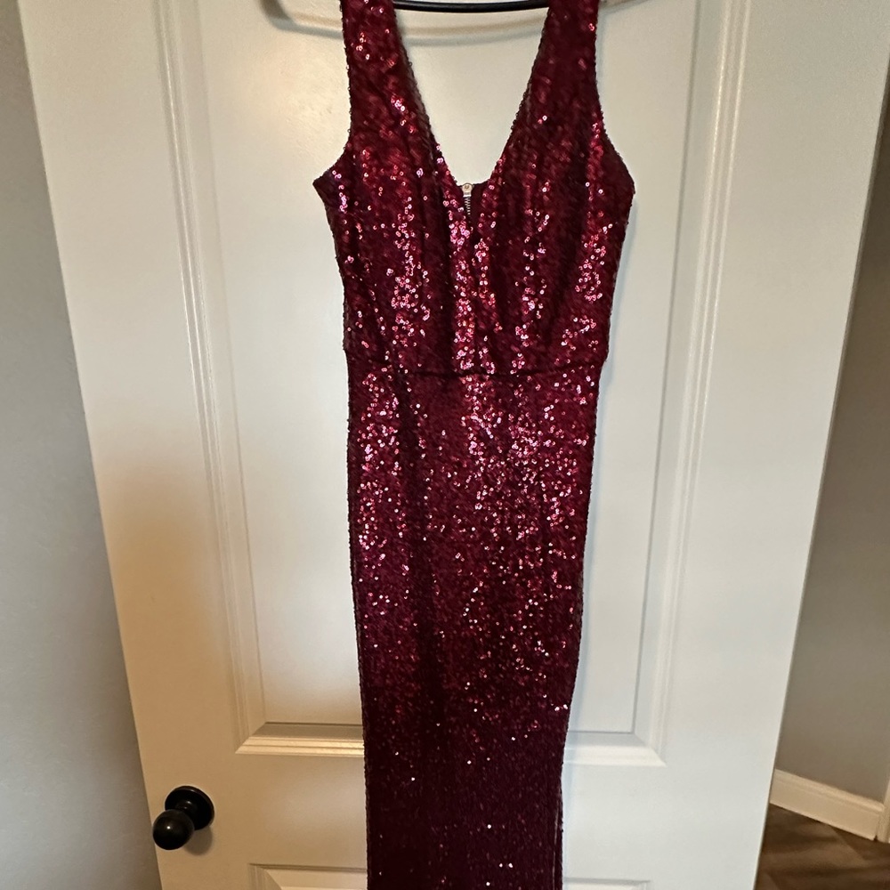 Sequin dark red gown.